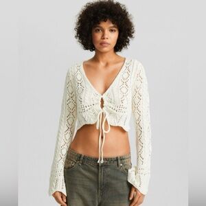 Open knit cardigan with gathered detail